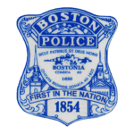Boston Police badge with 1854 founding date and motto.